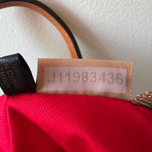 Dooney&Bourke All weather Leather Backpack with Contrast Suede Accent in Flap. - Picture 8 of 13